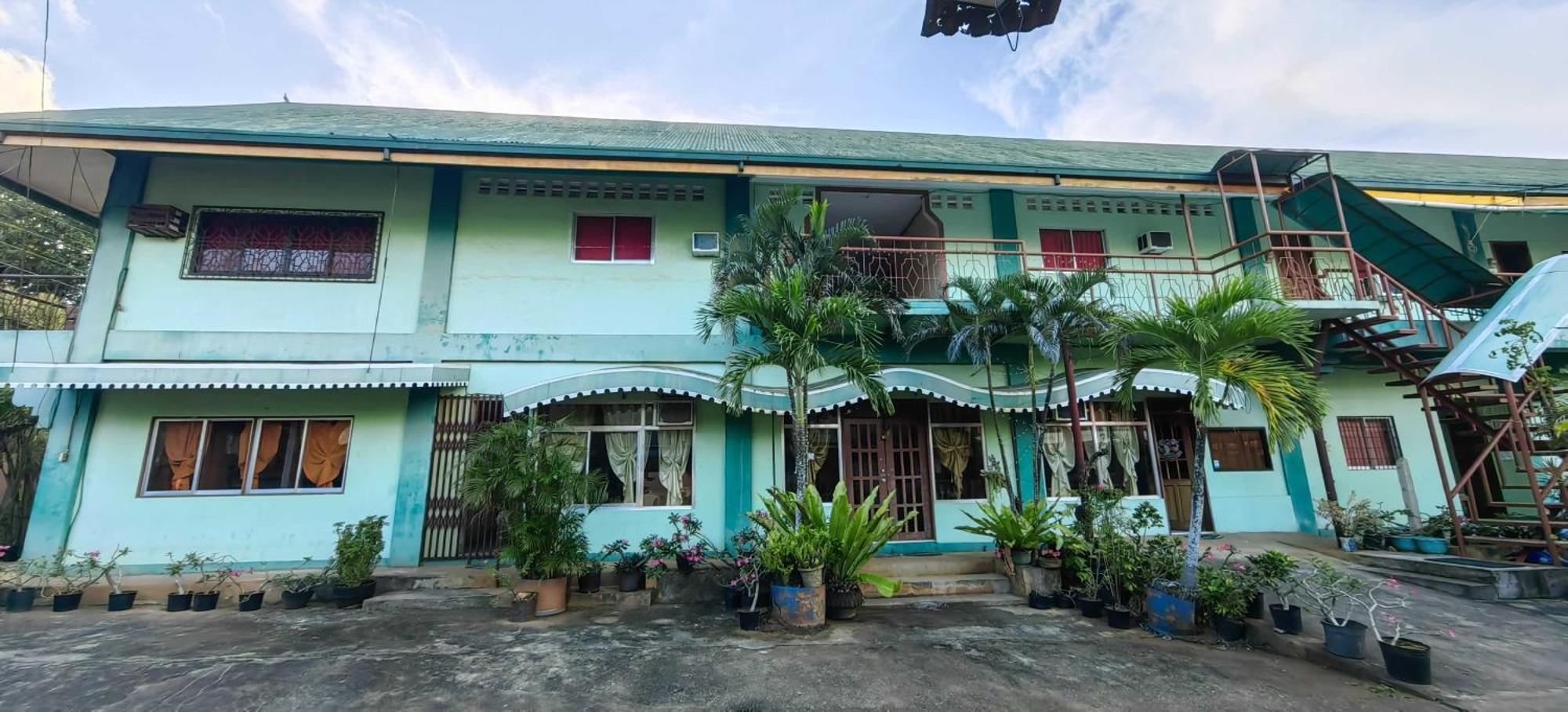 Oyo 1038 William Hearts Pension Puerto Princesa Buitenkant foto